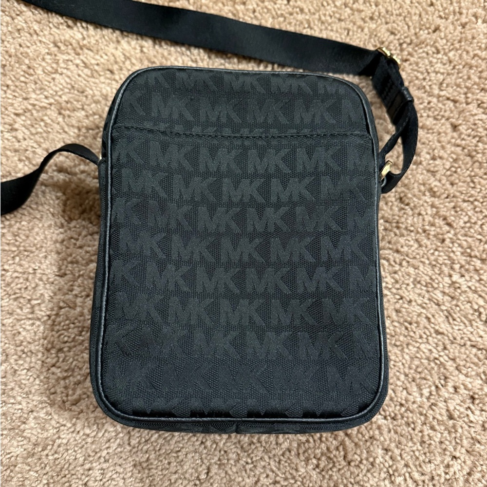 Michael Kors Black Messenger Bag with Gold Accents - Picture 2 of 5
